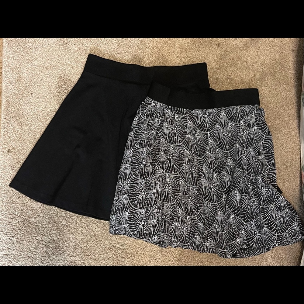 Mini pleated skirts. Silver one is very sparkly!